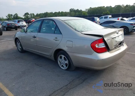 2003 Toyota Camry Le z USA, uszkodzony, nr VIN 4T1BE30K43U743251